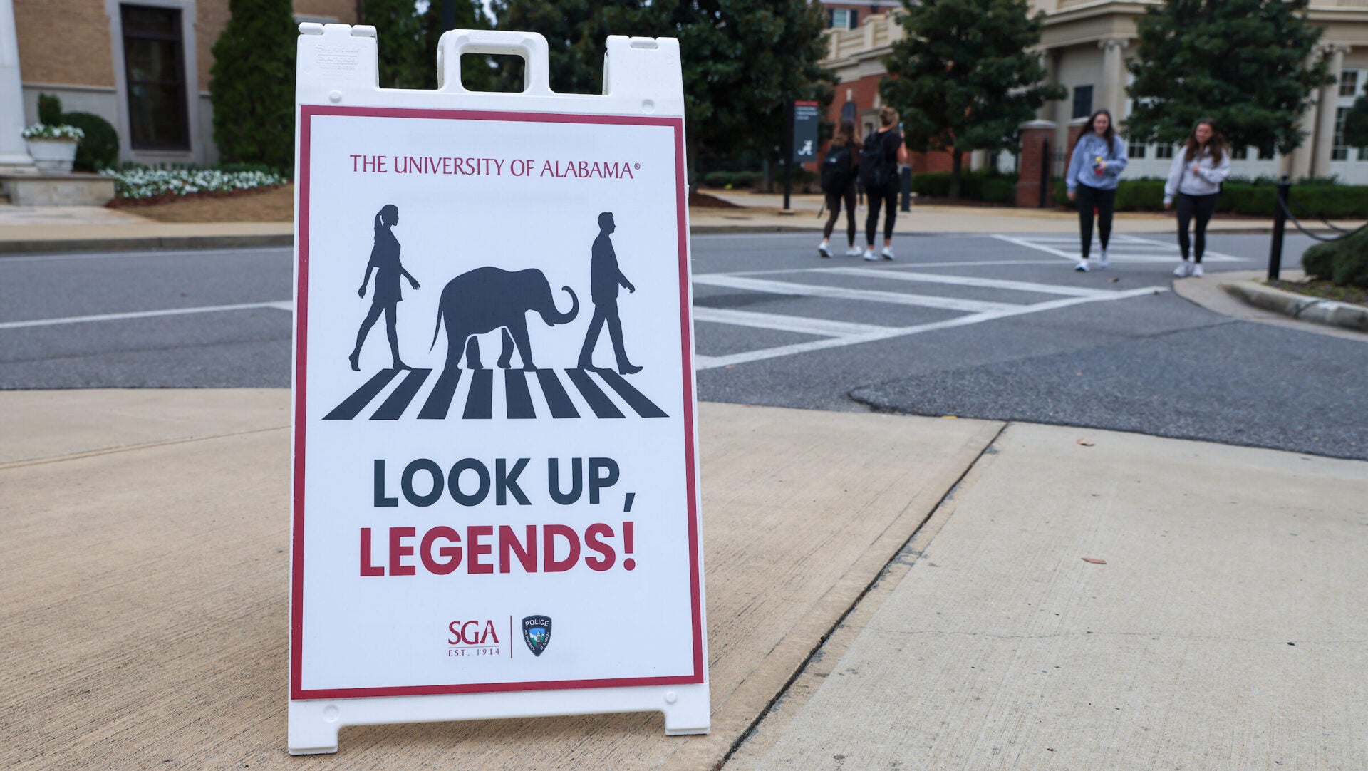 Look up Legends sign at a crosswalk