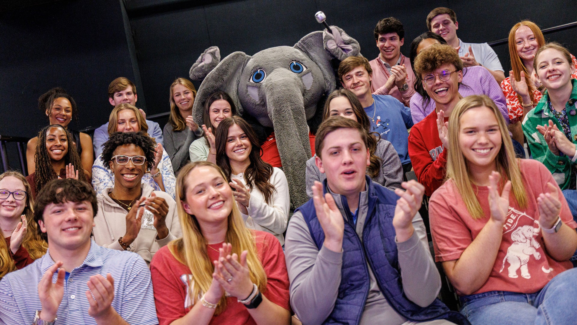 Students and Big Al clapping