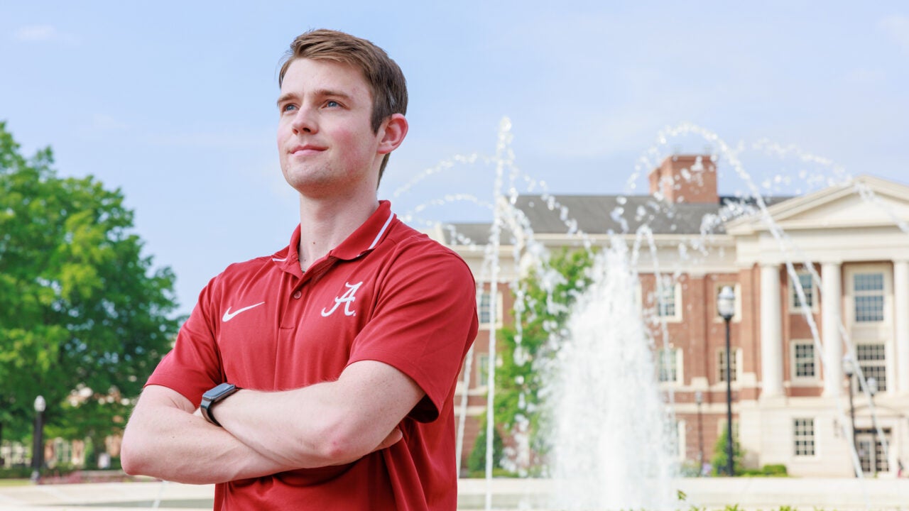 Reed Fowler stands outside Shelby Hall