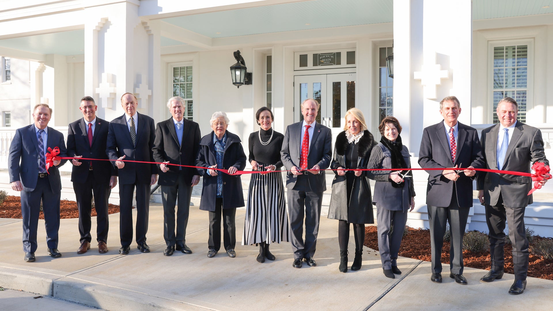 Stuart Bell and others at a ribbon cutting ceremony