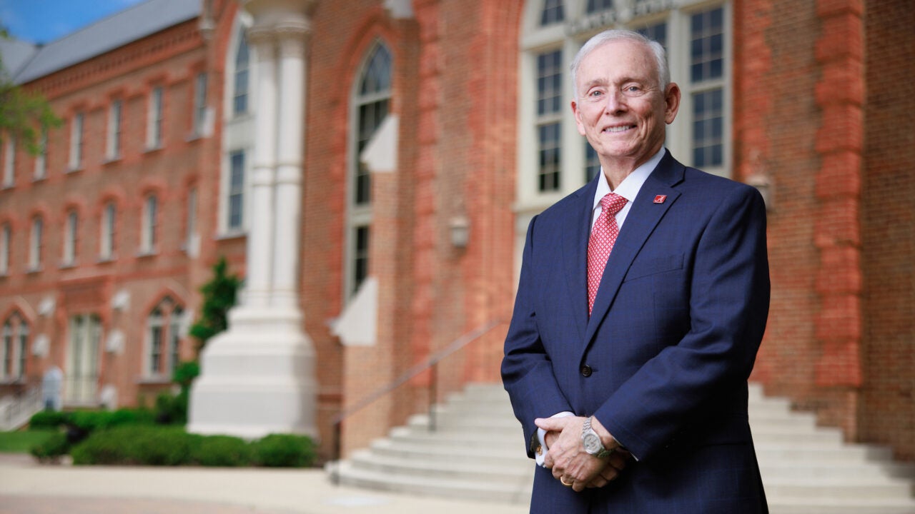 J Frank Barefield stands in front of Clark Hall