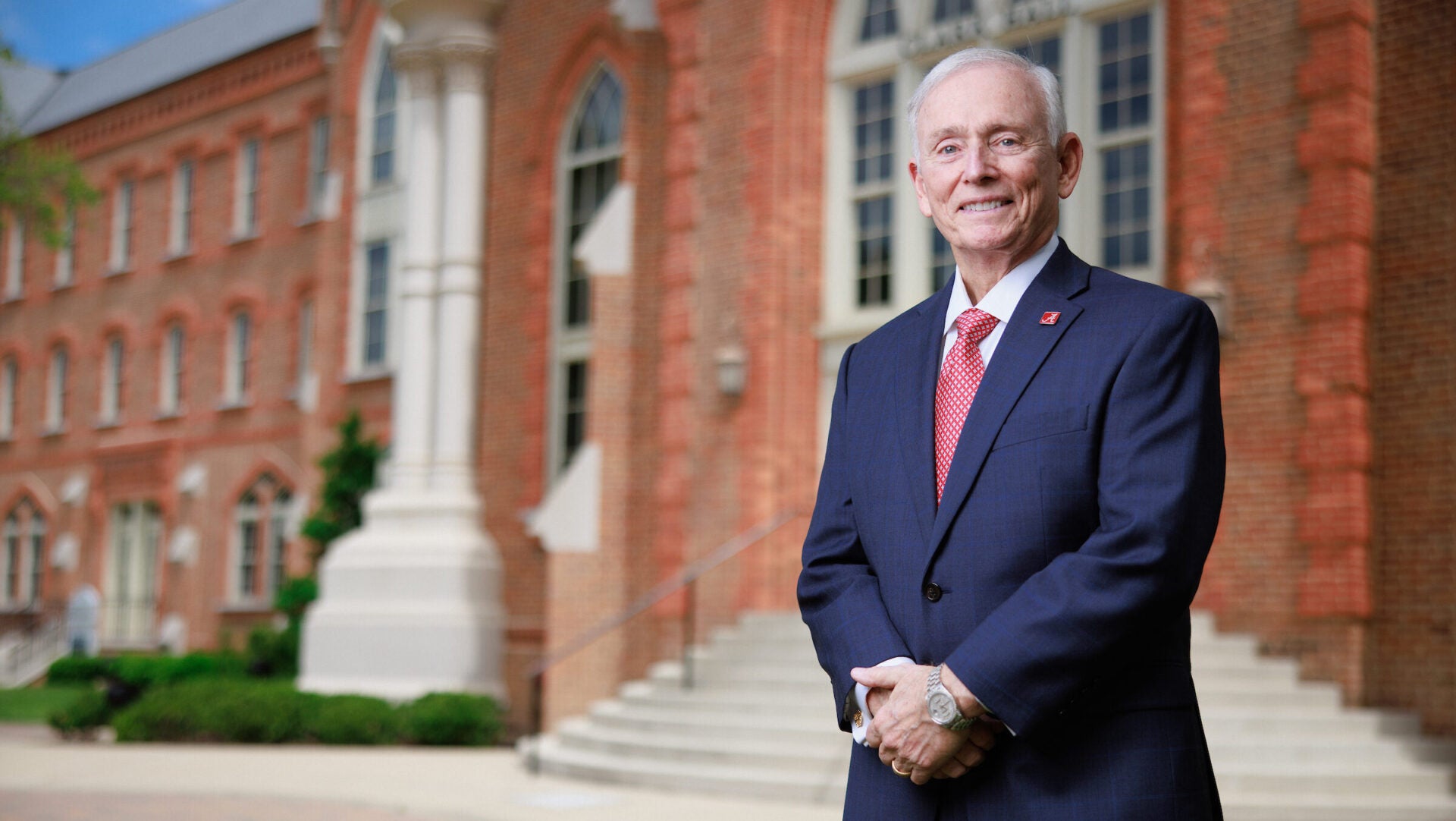 J Frank Barefield stands in front of Clark Hall
