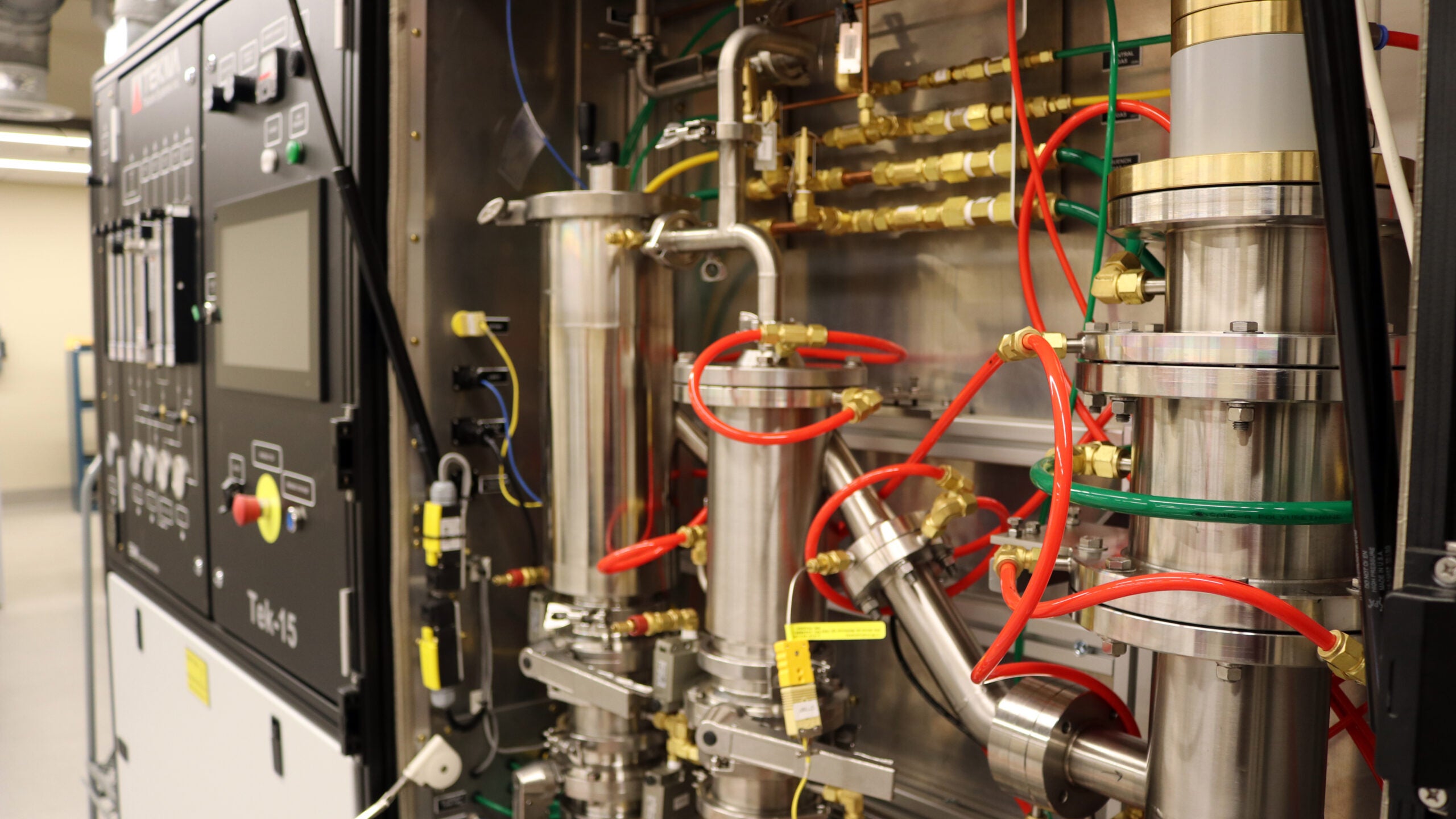 A close up of the Tekna Tek-15 plasma system used in AMI powder processing facility to create novel materials for additive manufacturing.