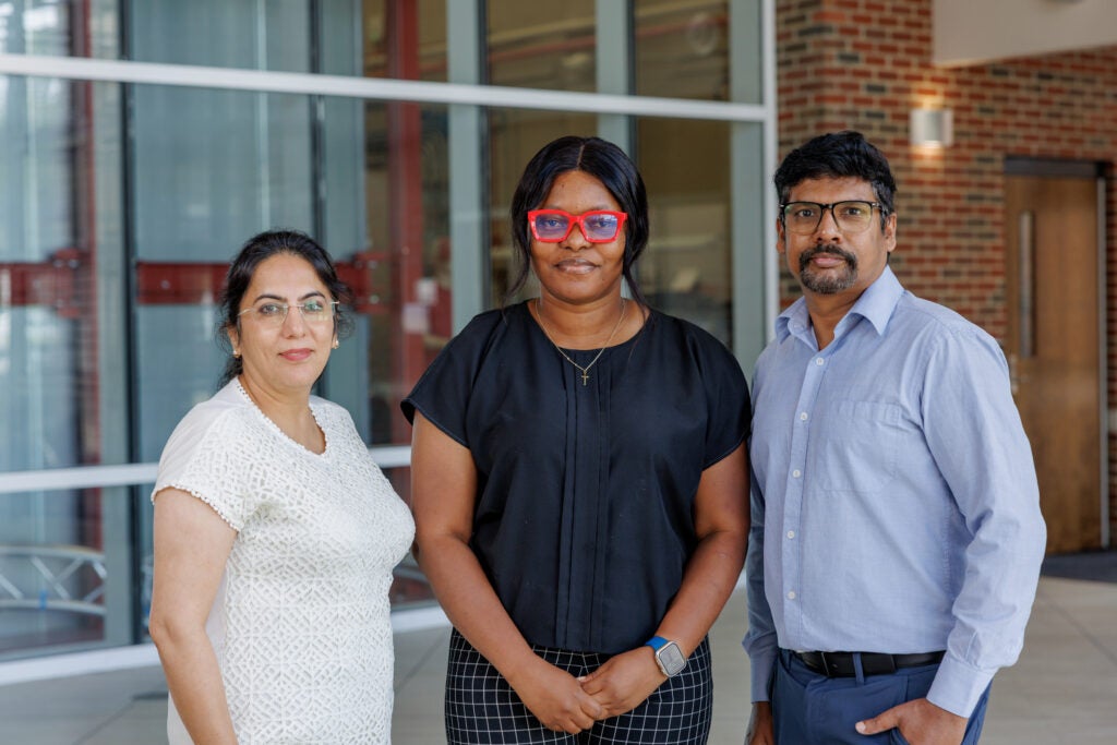 L-R: Dr. Meenakshi Arora, graduate student Abiodun Wahab, and Dr. Raghu Ganugula