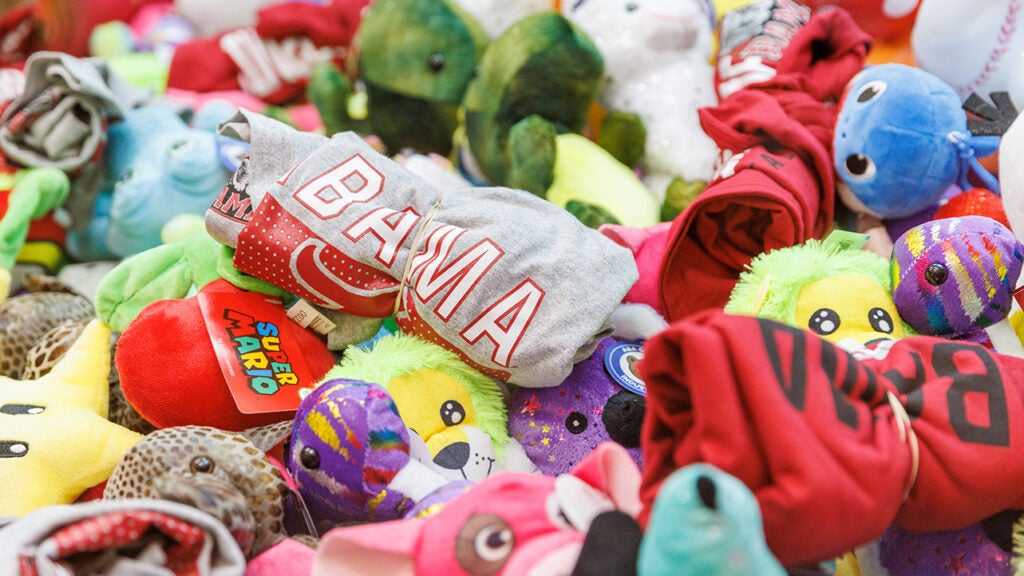 Merchandise inside a claw machine.