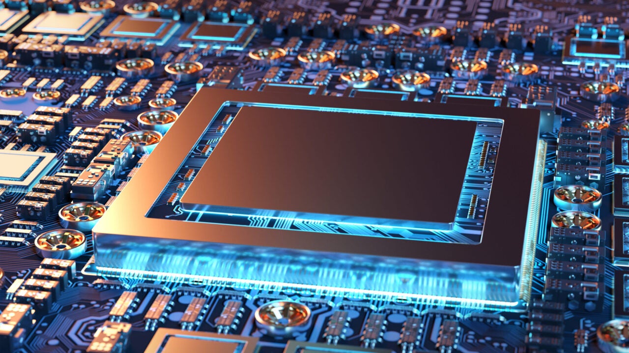 Close up of a GPU and circuit board with blue light