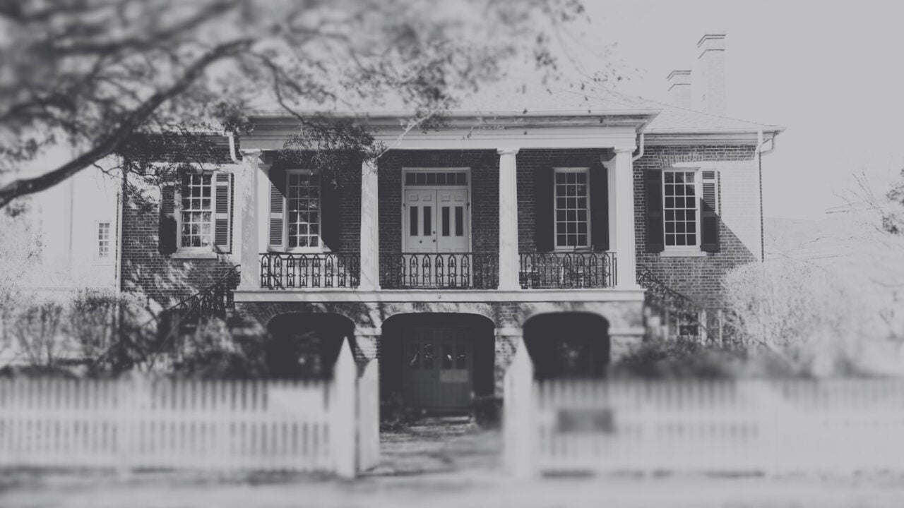 A black and white photo of the front exterior of the Gorgas House Museum