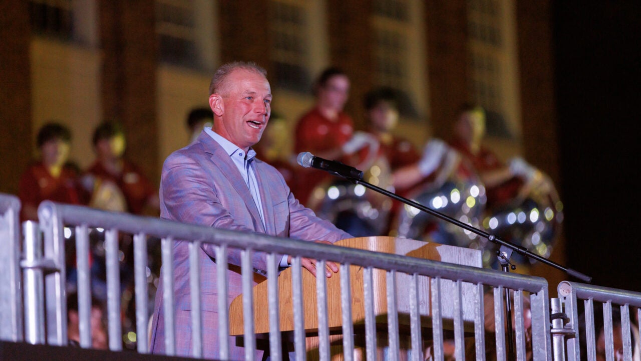 Coach Kalen DeBoer addresses the crowd at the pep rally