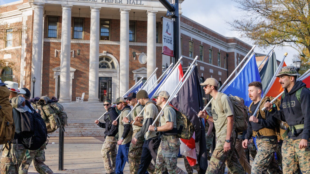 the ruckers walk down university boulevard