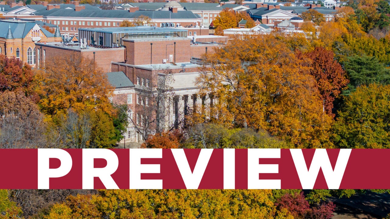 An aerial photo of Gorgas Library with fall foliage in the foreground