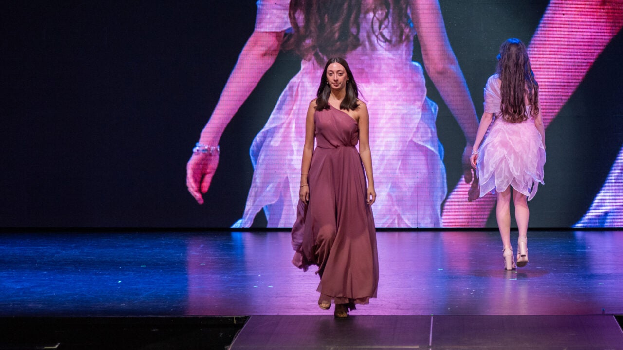 A model wearing a Design by Elle Schwartz