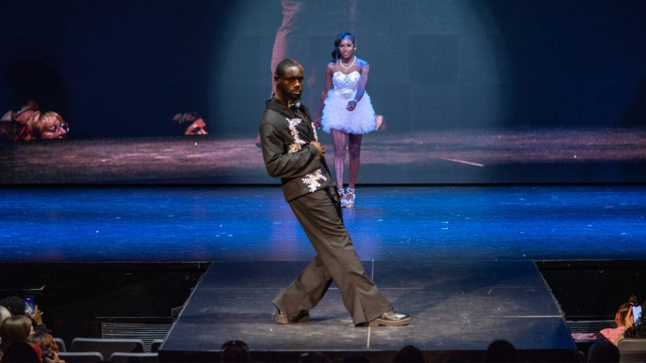 A model wearing a Design by Amiya Thomas