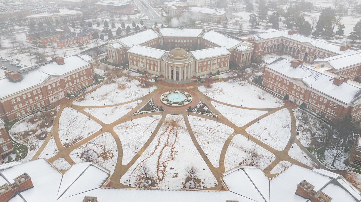 Snow covers the ground in this aerial view of Shelby Hall