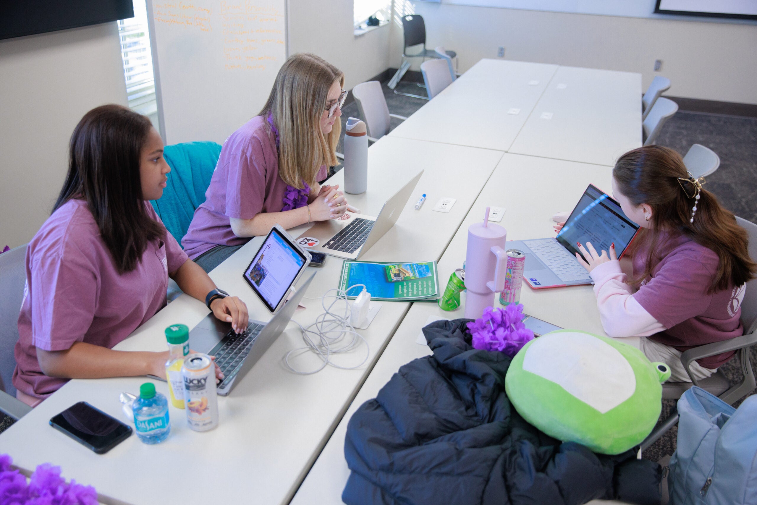 Students collaborating on their computers