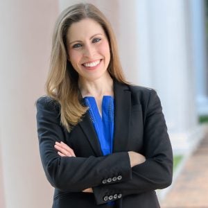 Morgan Luttig, director of choral activities and winner of the emerging scholar award