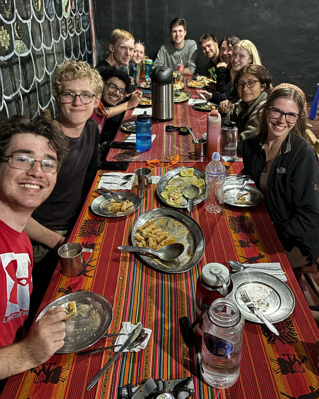 Students eating a meal together.